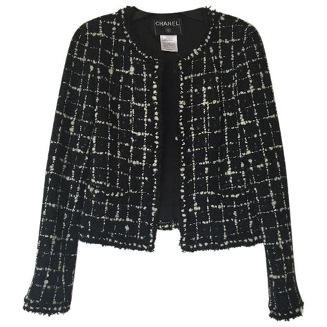 chanel suits chain at the bottom of jackets|chanel black tweed jacket.